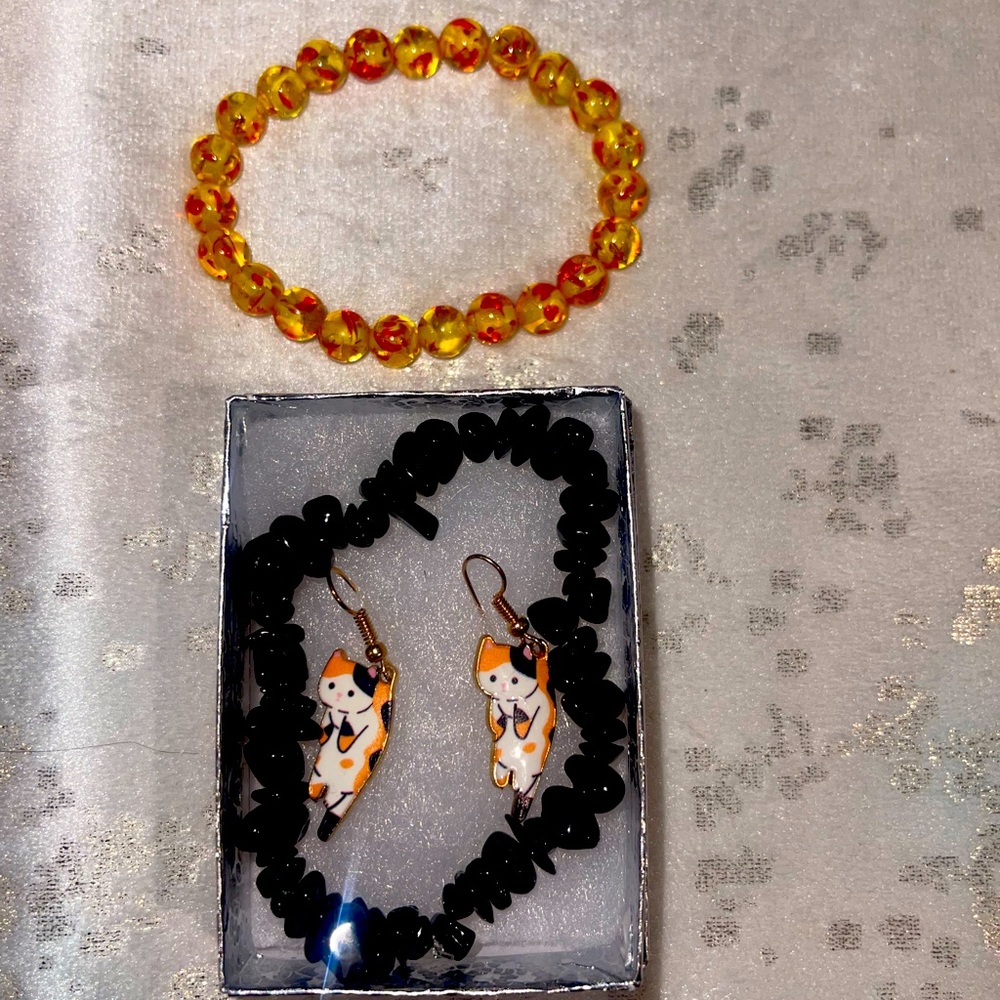 Two bracelets and cat earrings